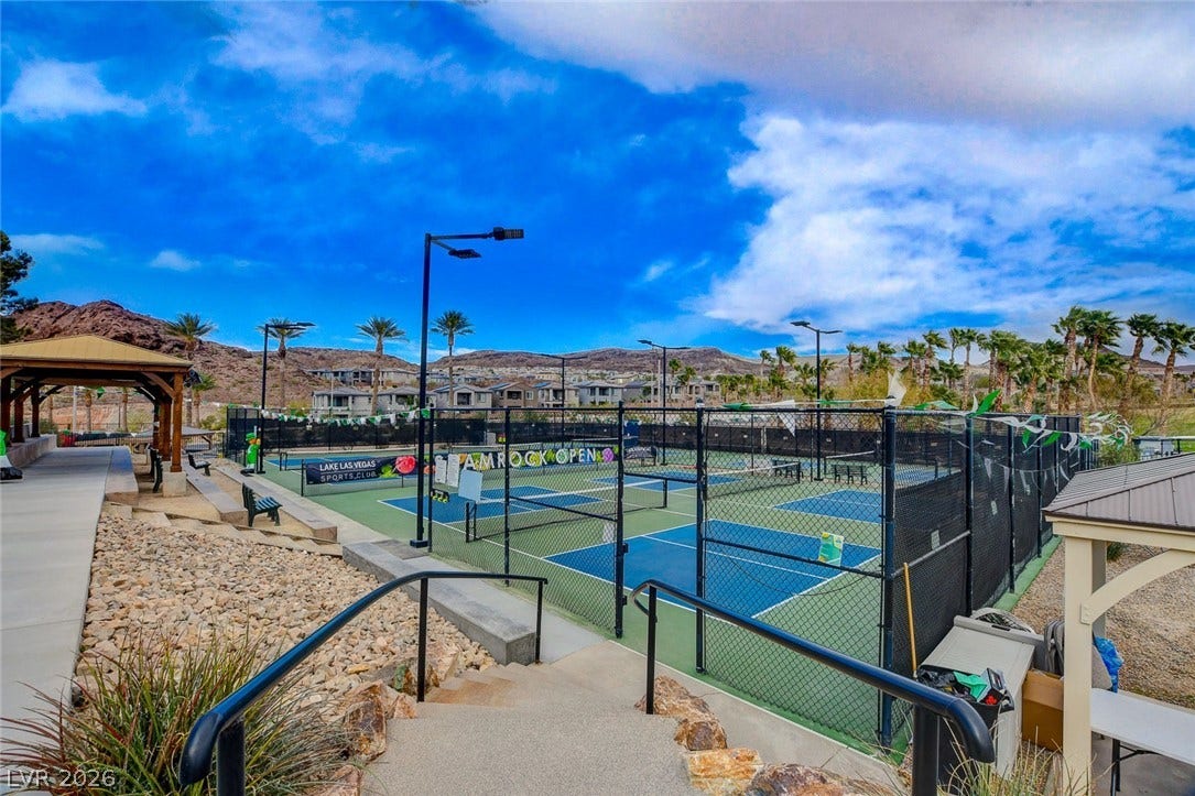 51 Thorn Creek Street, Henderson, NV 89011 View of tennis court featuring a gazebo, a patio area, and a residential view
