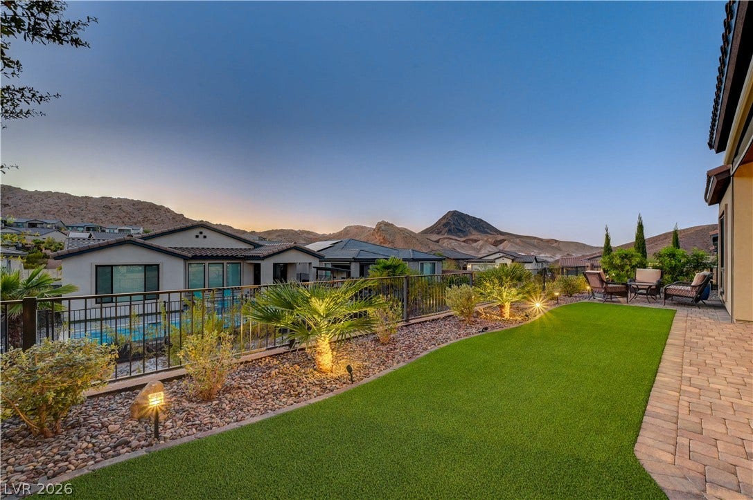 51 Thorn Creek Street, Henderson, NV 89011 Fenced backyard with a mountain view, a patio area, and a residential view