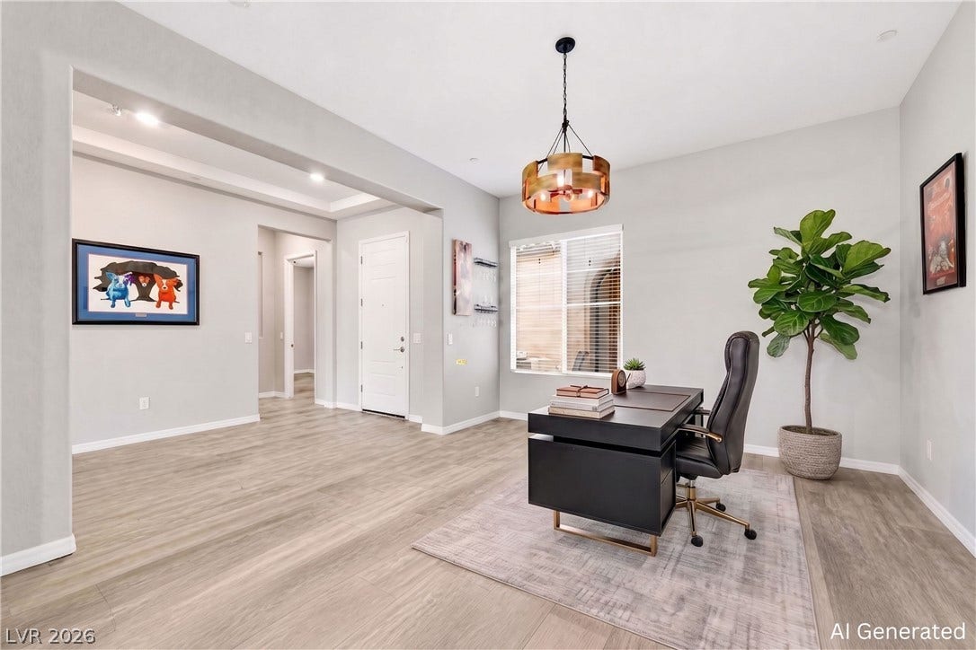 51 Thorn Creek Street, Henderson, NV 89011 Gleaming wood floors and a tray ceiling define this versatile work-from-home office space. AI-generated image.
