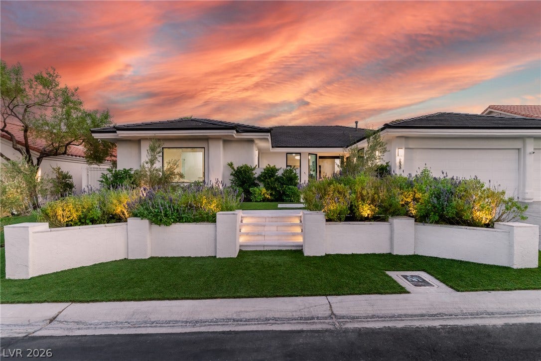8633 Robinson Ridge Drive, Las Vegas, NV 89117 Manicured landscaping and clean architectural lines create an inviting entry to this modern residence.