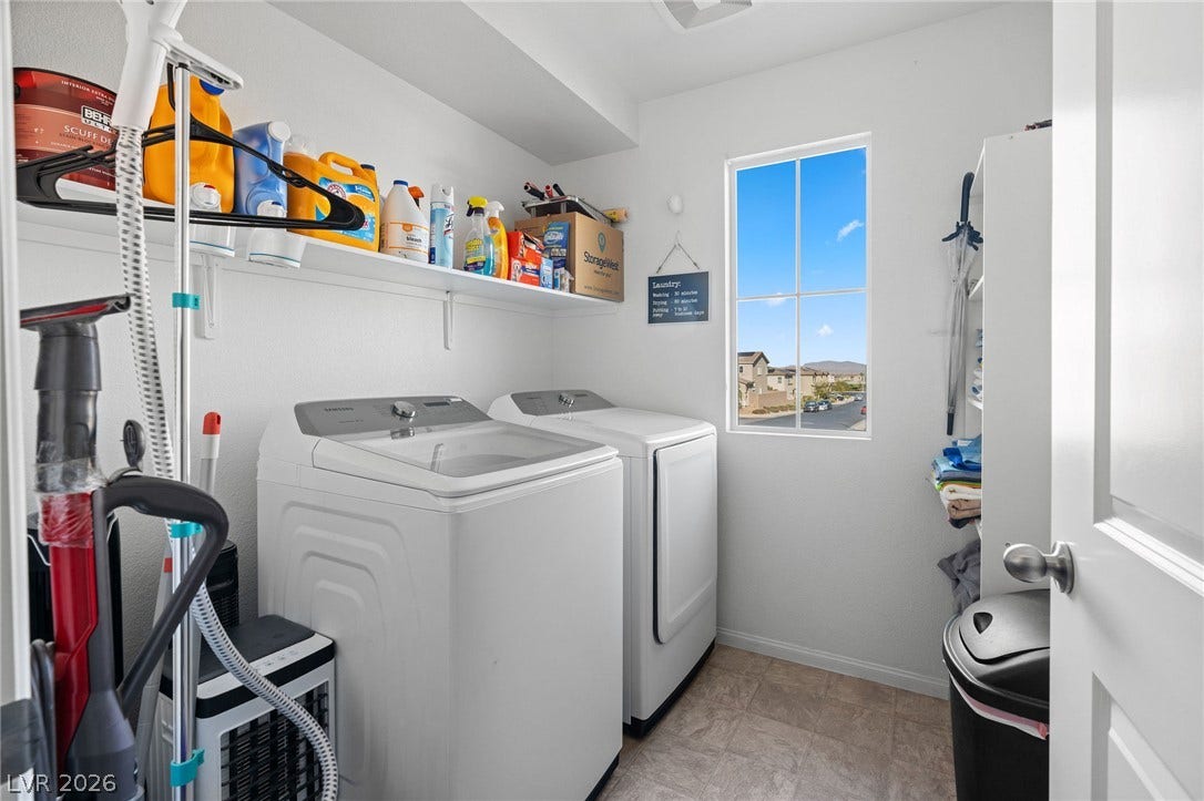 4605 Fragrant Street, North Las Vegas, NV 89031 Functional workspace features durable flooring, overhead shelving, and a window overlooking the neighborhood.