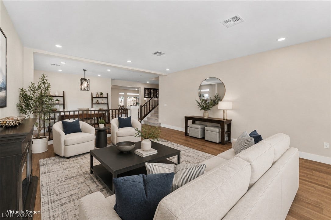 8724 Fortplaid Street, Las Vegas, NV 89139 An open floor plan seamlessly connects the main living space with adjacent dining and entry areas.