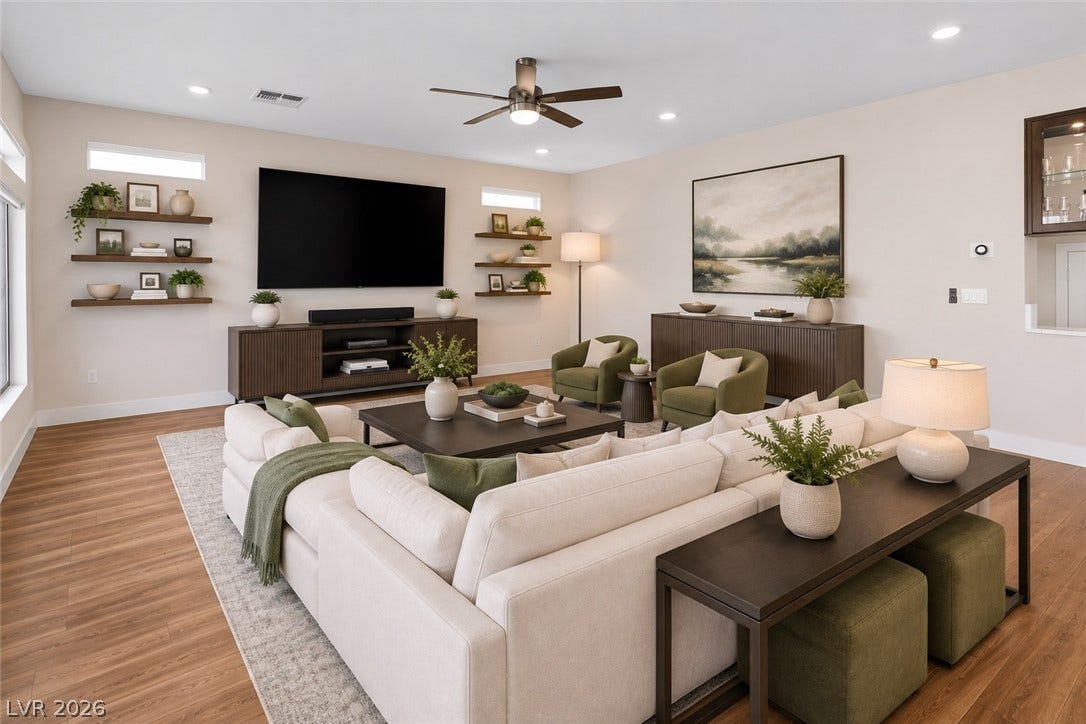 8724 Fortplaid Street, Las Vegas, NV 89139 Gleaming wood flooring complements the airy feel of this open-concept main living space.