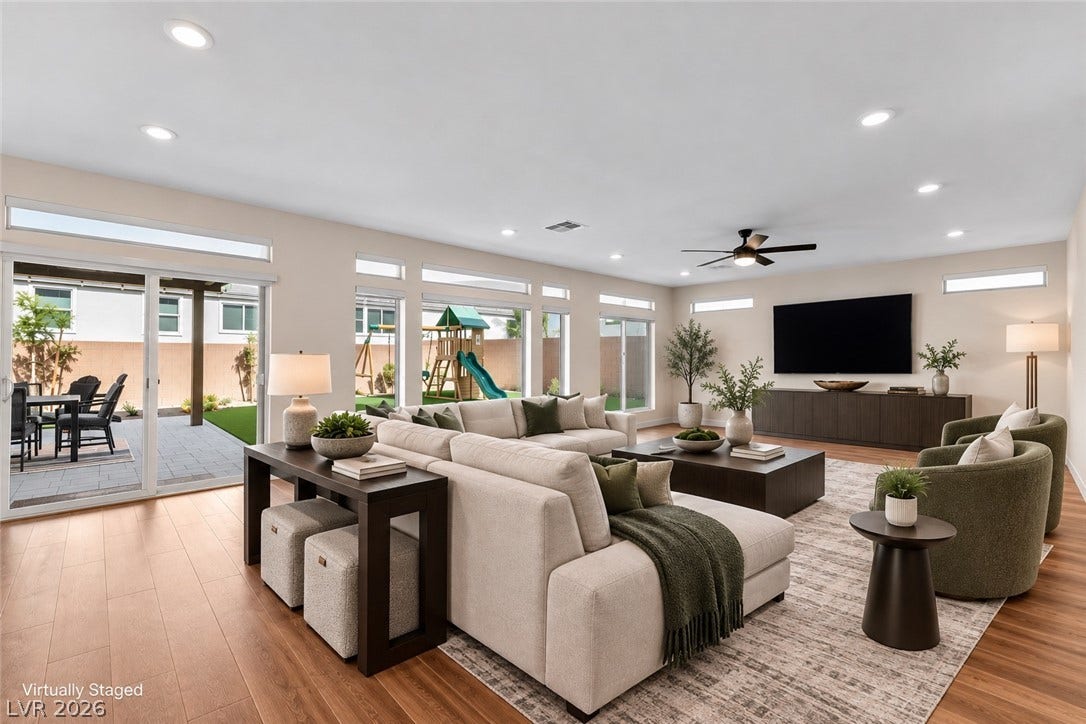 8724 Fortplaid Street, Las Vegas, NV 89139 An open living space highlights clean line flooring and recessed lighting.