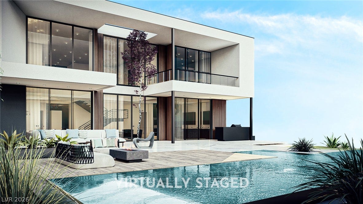 410 Net Zero Drive, Henderson, NV 89012 Striking modern architectural lines define this dual-level residence opening to a pristine pool.