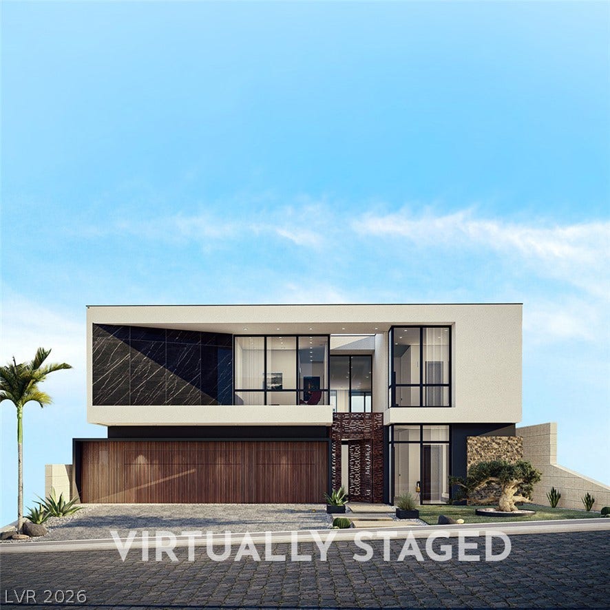 410 Net Zero Drive, Henderson, NV 89012 Striking contemporary architecture defines this luxury facade with extensive glass and clean geometric lines.