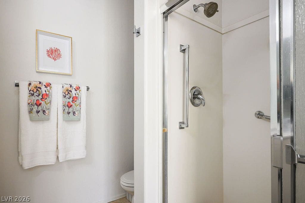 Clean lines and classic fixtures define this functional bathroom layout.