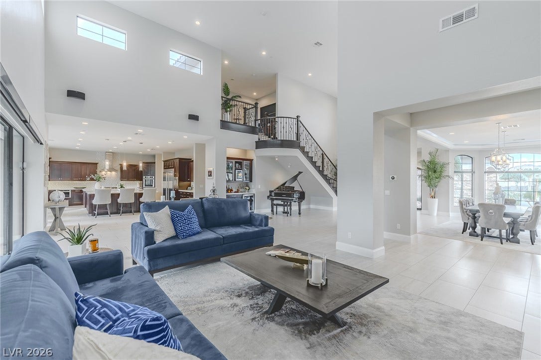 240 San Salvador Avenue, Henderson, NV 89002 Towering ceilings and an open floorplan create a grand first impression in this living area.