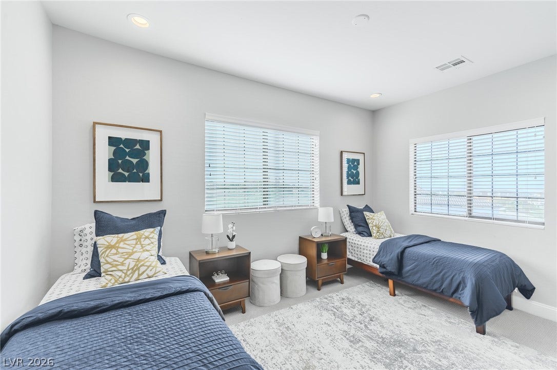 240 San Salvador Avenue, Henderson, NV 89002 Recessed lighting and dual windows with blinds illuminate this versatile second bedroom.