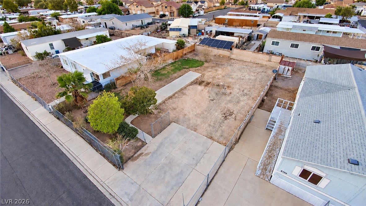 6196 Castlemont Avenue, Las Vegas, NV 89156 An aerial perspective showcases a spacious lot situated within an established residential neighborhood.