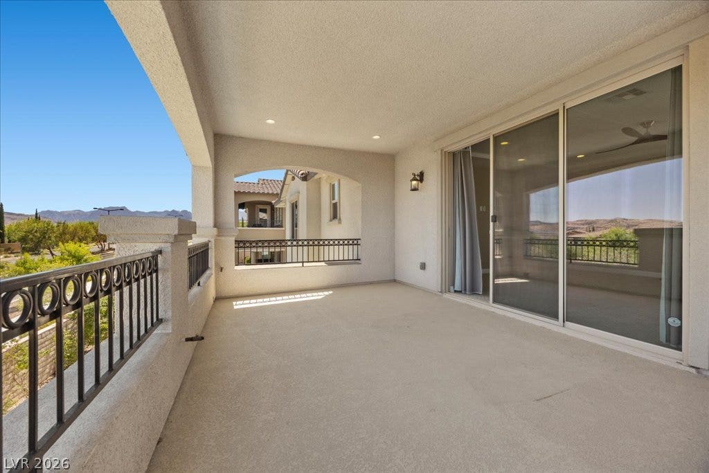 12021 Abbracci Avenue, Las Vegas, NV 89138 Step onto this covered patio offering elevated outdoor living with clear desert and mountain views.