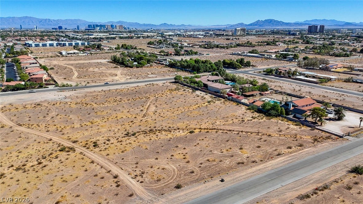 Pebble Road, Las Vegas, NV 89124 Distant skyline vistas frame this expansive desert parcel situated near paved roads.