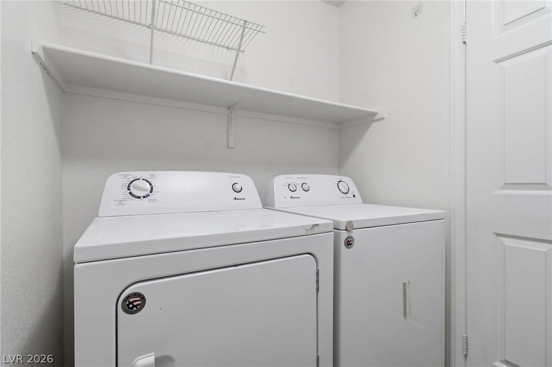 1891 Eagle Flight Lane, Henderson, NV 89012 Functional utility space features overhead shelving above the laundry appliances.