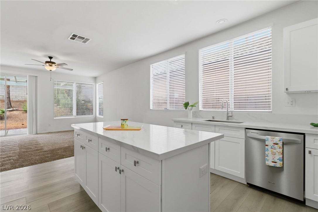 1891 Eagle Flight Lane, Henderson, NV 89012 An open kitchen layout transitions smoothly into a comfortable adjoining living space.