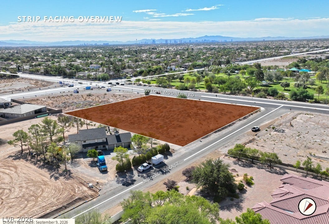 West Lone Mountain, Las Vegas, NV 89149 An expansive desert parcel offers sweeping views stretching toward the distant city skyline.