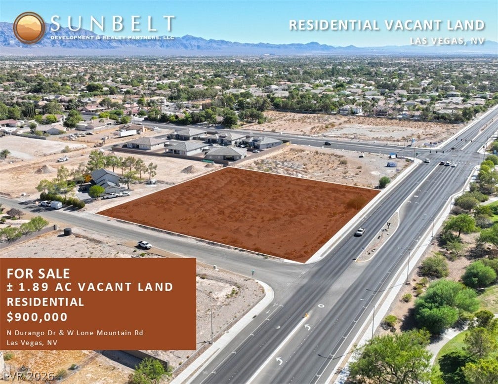 West Lone Mountain, Las Vegas, NV 89149 An aerial perspective showcases a prime residential vacant lot bordered by paved city streets.