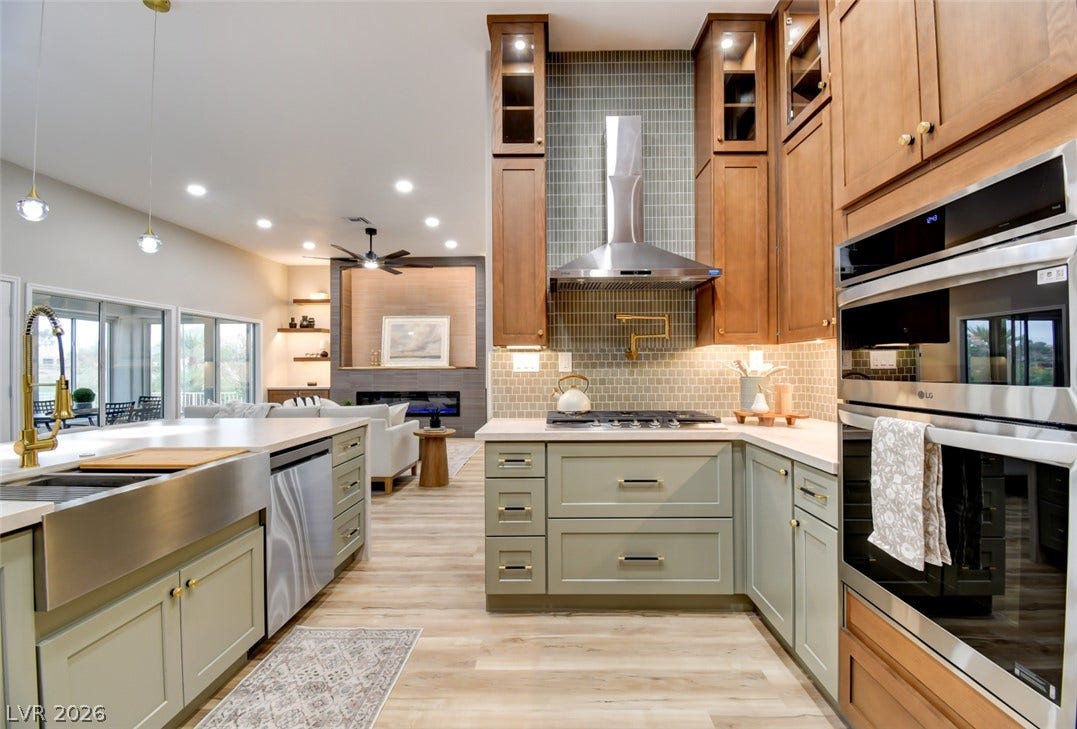 2837 Billy Casper Drive, Las Vegas, NV 89134 An open kitchen layout boasts sleek quartz counters and clean lines. Corner pullout for extra storage.