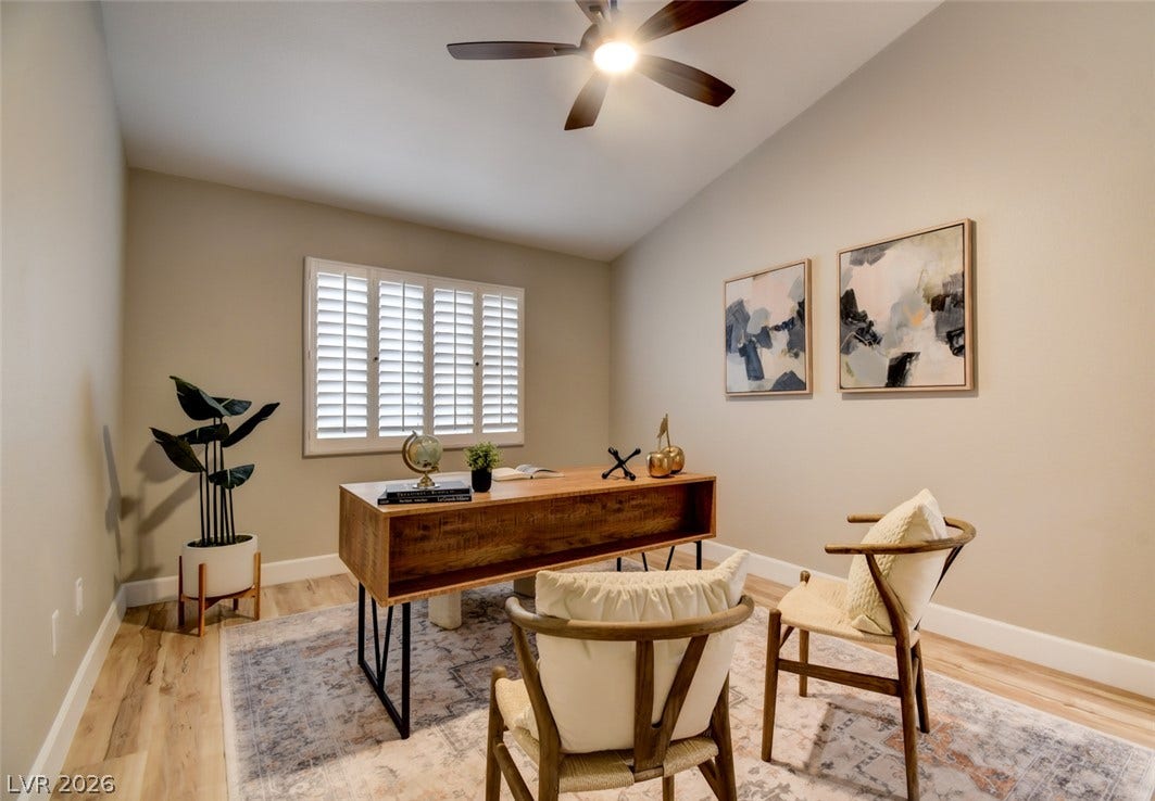 2837 Billy Casper Drive, Las Vegas, NV 89134 Warm wood tones create an inviting work environment with plantation shutters.