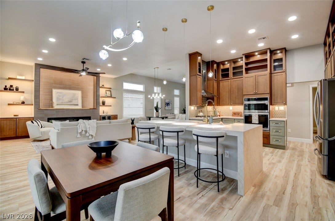 2837 Billy Casper Drive, Las Vegas, NV 89134 An open floor plan seamlessly connects the kitchen and dining areas under high recessed ceilings.
