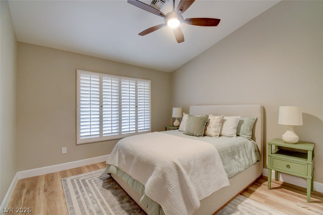 2837 Billy Casper Drive, Las Vegas, NV 89134 Luxury vinyl flooring, wooden shutters, view of golf course create a relaxing and airy atmosphere.