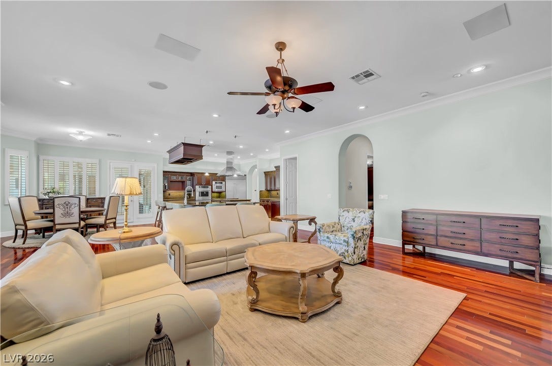 2030 Marina Bay Court, Las Vegas, NV 89117 Rich hardwood flooring complements the spacious open-concept living area and adjacent kitchen.