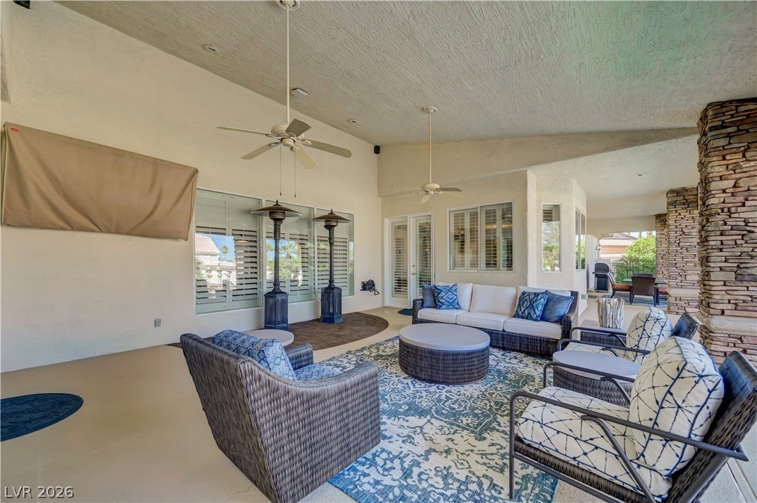 2030 Marina Bay Court, Las Vegas, NV 89117 Stone pillars and a textured ceiling shelter this generous outdoor living space.