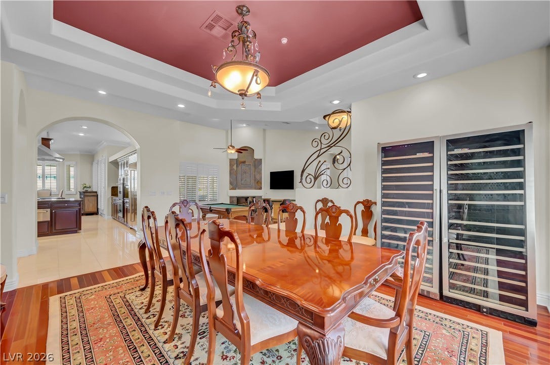 2030 Marina Bay Court, Las Vegas, NV 89117 Rich hardwood floors and a recessed tray ceiling define this elegant formal dining space.