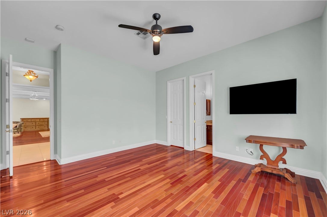 2030 Marina Bay Court, Las Vegas, NV 89117 Gleaming hardwood floors run throughout this versatile space featuring clean lines and high ceilings.