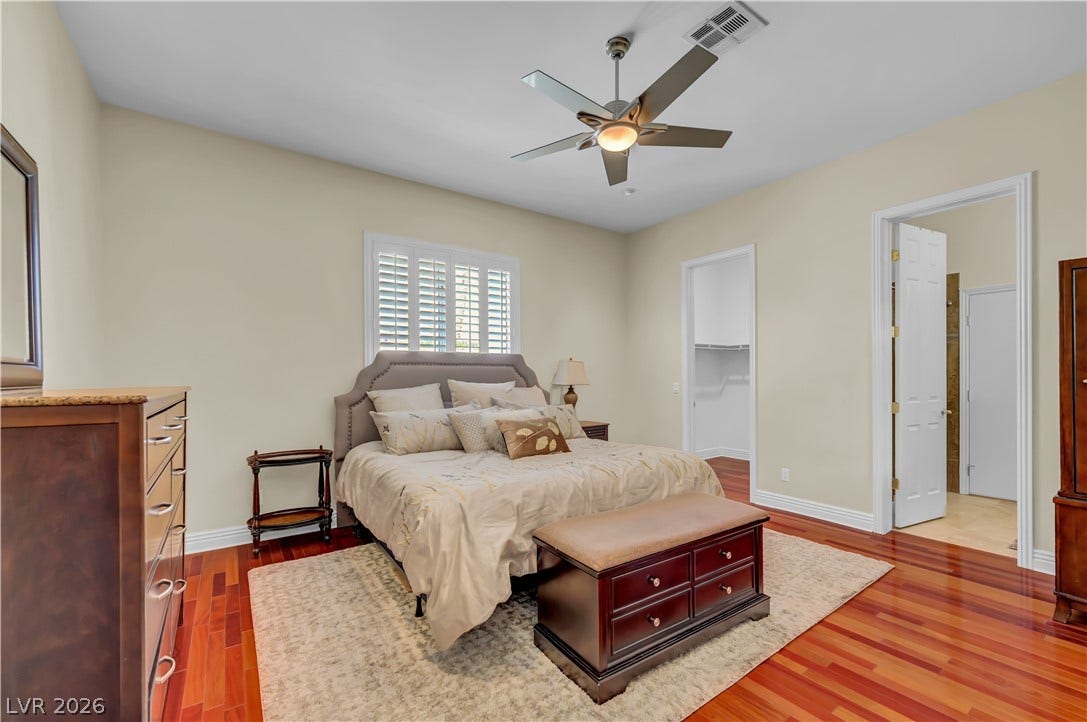 2030 Marina Bay Court, Las Vegas, NV 89117 Gleaming hardwood floors and classic plantation shutters elevate this peaceful sleeping retreat.