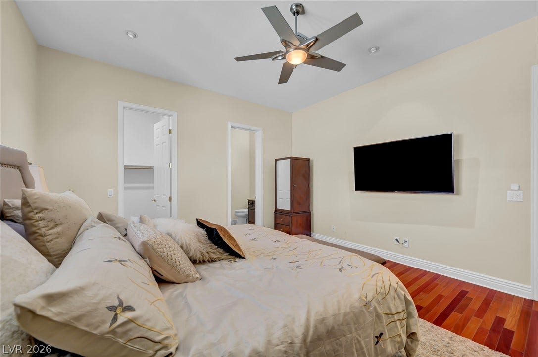 2030 Marina Bay Court, Las Vegas, NV 89117 Gleaming hardwood floors and recessed lighting enhance this bedroom with access to a walk-in closet.