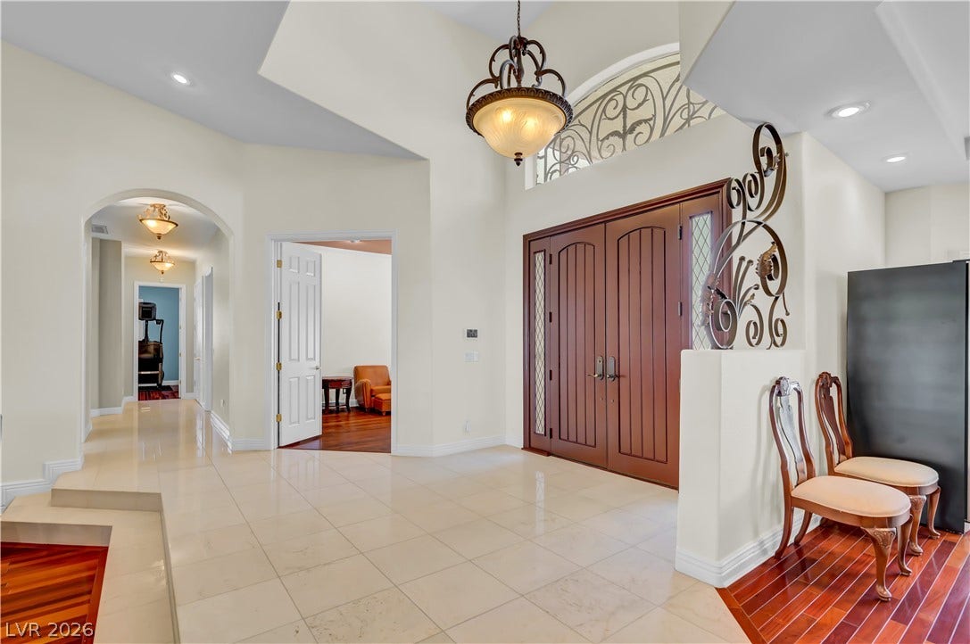 2030 Marina Bay Court, Las Vegas, NV 89117 Double entry doors and high ceilings welcome guests into a grand entryway.