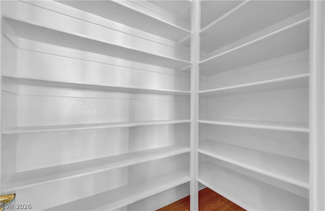2030 Marina Bay Court, Las Vegas, NV 89117 Floor-to-ceiling built-in shelving maximizes storage capacity within this functional walk-in pantry.