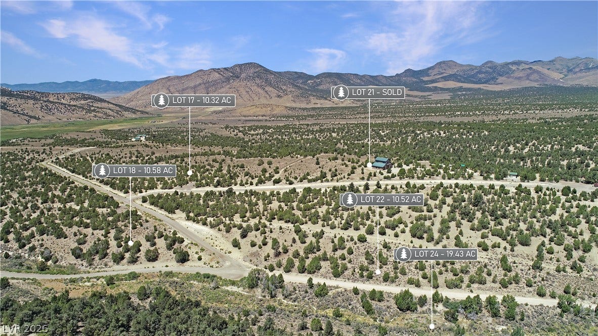 5205 E BIRD CREEK Road, Ely, NV 89301 Vast mountain ridges rise dramatically beyond expansive acreage dotted with native pinon pines.