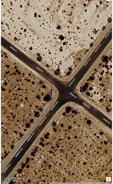 Satellite perspective highlights the property boundaries and surrounding desert landscape.