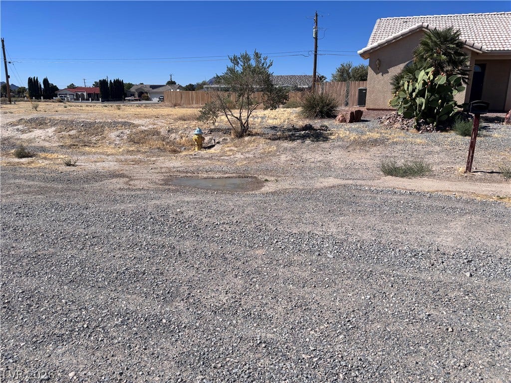 941 E Enchanted Mesa Street, Pahrump, NV 89048 Lot across the street has fire hydrant.