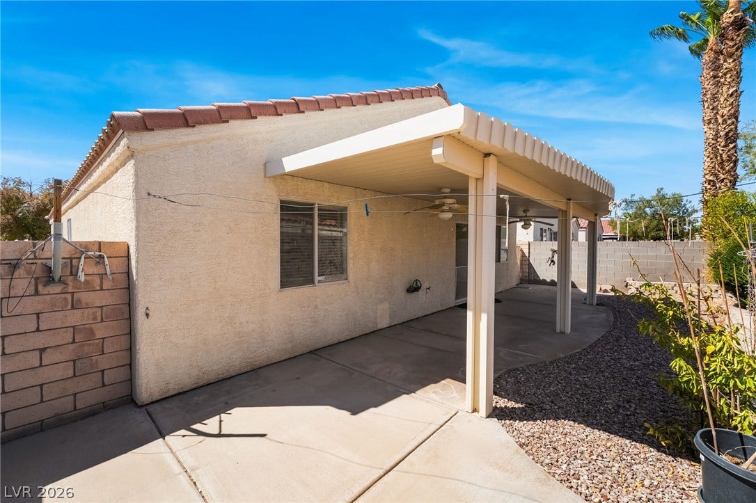 769 Salt Flats Circle, Henderson, NV 89011 Shaded concrete patio extends the living space outdoors under a durable tile roof.