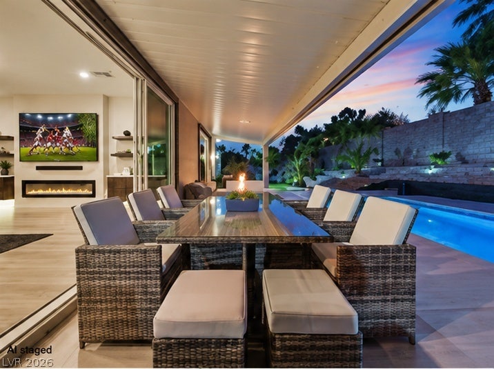2689 Pioneer Estates Court, Las Vegas, NV 89117 Seamless transitions connect the sheltered outdoor dining space directly to the main living area.
