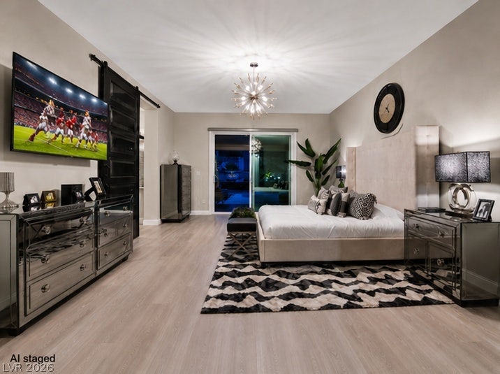 2689 Pioneer Estates Court, Las Vegas, NV 89117 Warm wood flooring and sliding glass patio doors highlight this expansive bedroom suite.