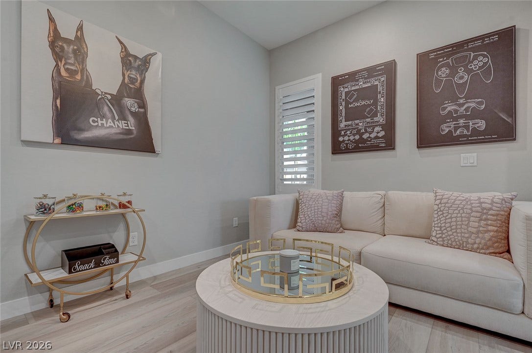 2689 Pioneer Estates Court, Las Vegas, NV 89117 Smooth wood floors and crisp baseboards anchor this inviting living space.