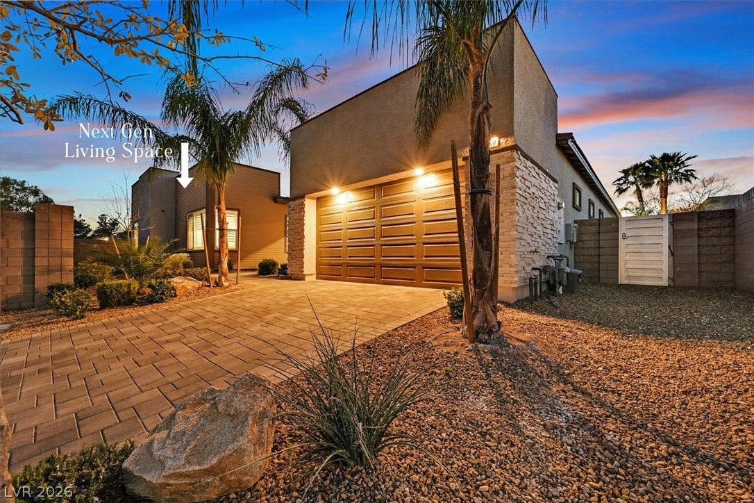 2689 Pioneer Estates Court, Las Vegas, NV 89117 Modern architecture defines this sleek exterior featuring a paved driveway and NEXT GEN LIVING