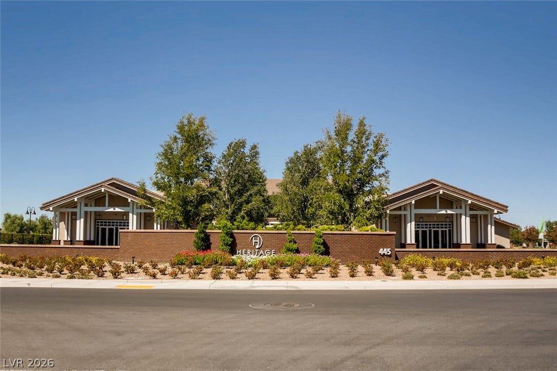 647 Longfeather Street, Henderson, NV 89011 An inviting monument sign and landscaped entryway welcome residents to the community clubhouse.