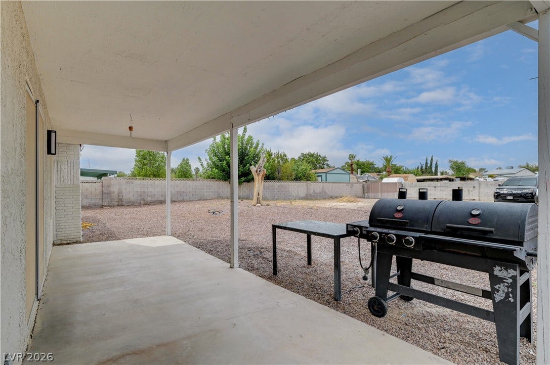 2829 N Michael Way, Las Vegas, NV 89108 A spacious covered patio looks out over the low-maintenance, block-walled backyard.