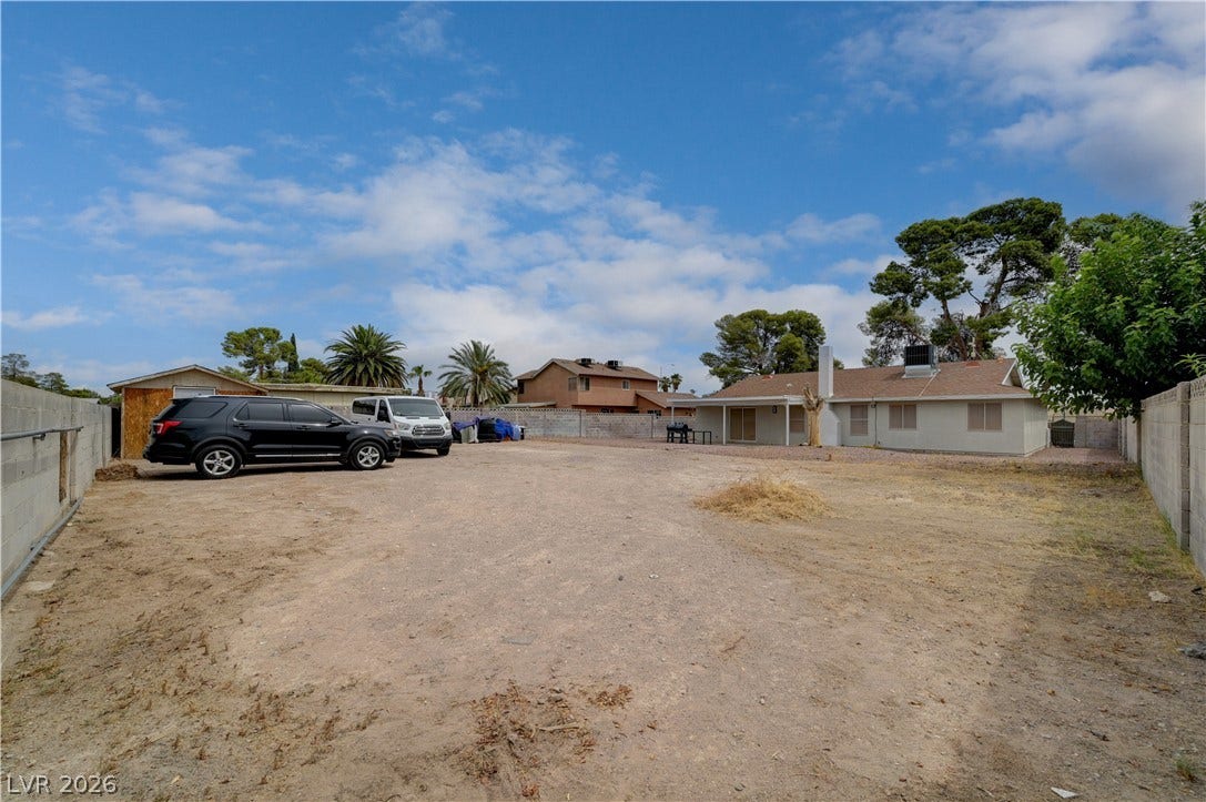 2829 N Michael Way, Las Vegas, NV 89108 A spacious backyard area offers immense potential for customization and outdoor recreation.