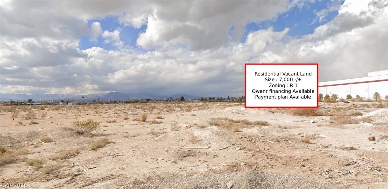 Tamrin, North Las Vegas, NV 89030 Distant mountains frame this open residential parcel under expansive desert skies.