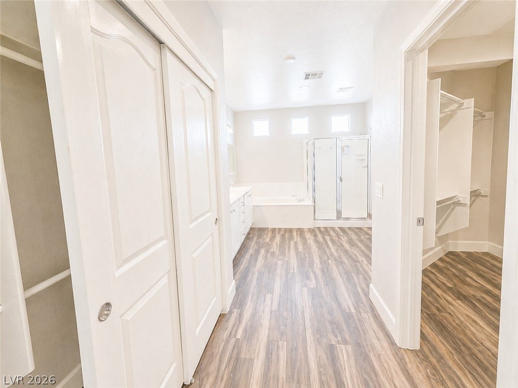 2237 Merrimack Valley Avenue, Henderson, NV 89044 spacious primary bathroom suite featuring a built-in closet system.