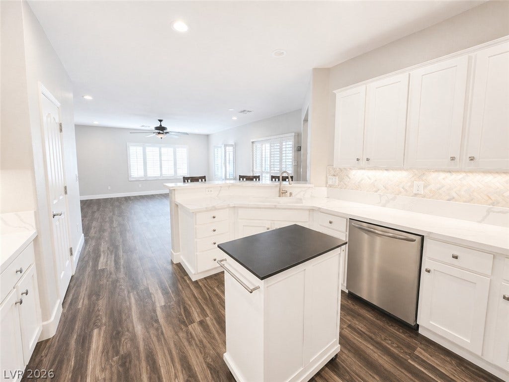 2237 Merrimack Valley Avenue, Henderson, NV 89044 Large Kitchen with Many Crisp white cabinetry paired with durable defines this airy, open-concept kitchen.