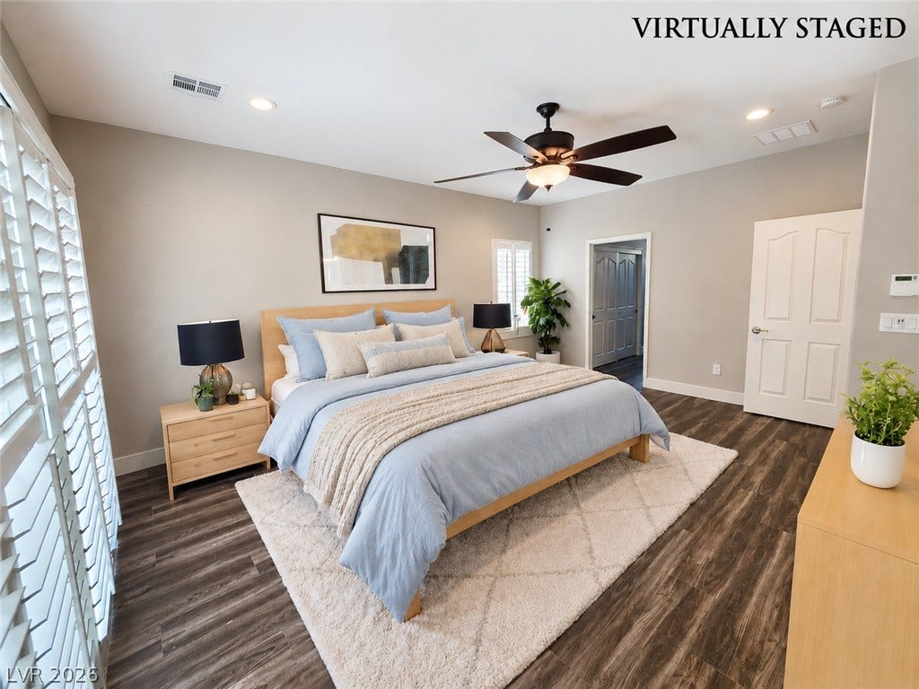 2237 Merrimack Valley Avenue, Henderson, NV 89044 Rich tile flooring and crisp plantation shutters define this inviting bedroom space. Leads out to the oasis pool and spa