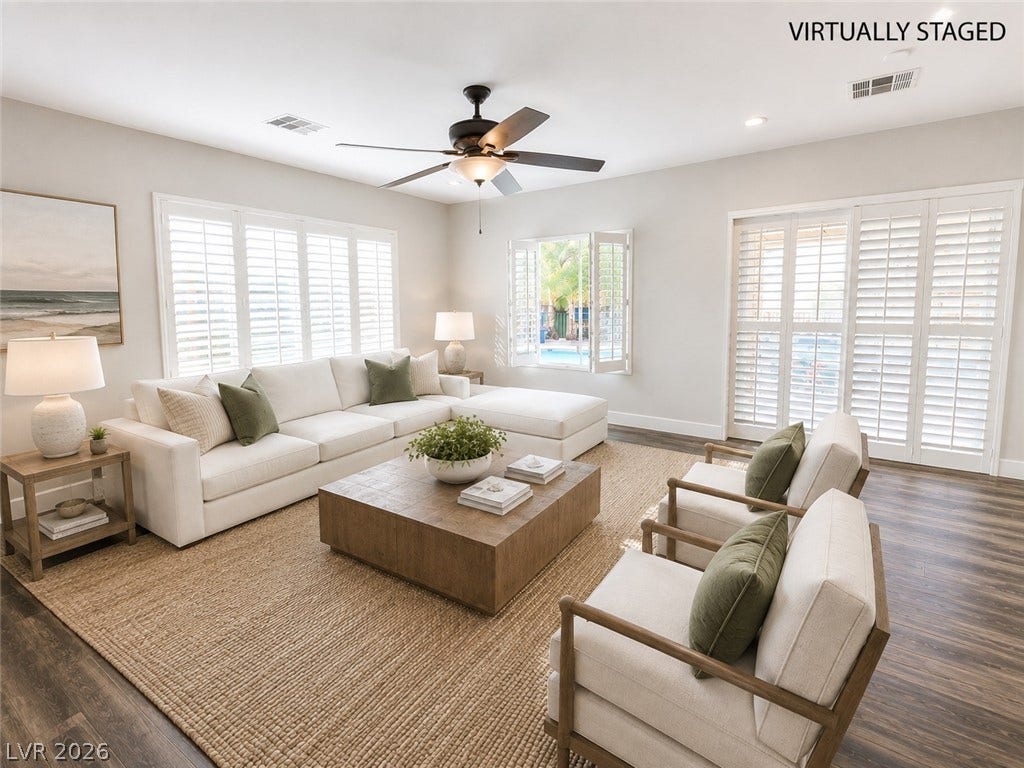 2237 Merrimack Valley Avenue, Henderson, NV 89044 Two ways to decorated your Livingroom Gleaming tile floors and classic plantation shutters define this open, airy living space.