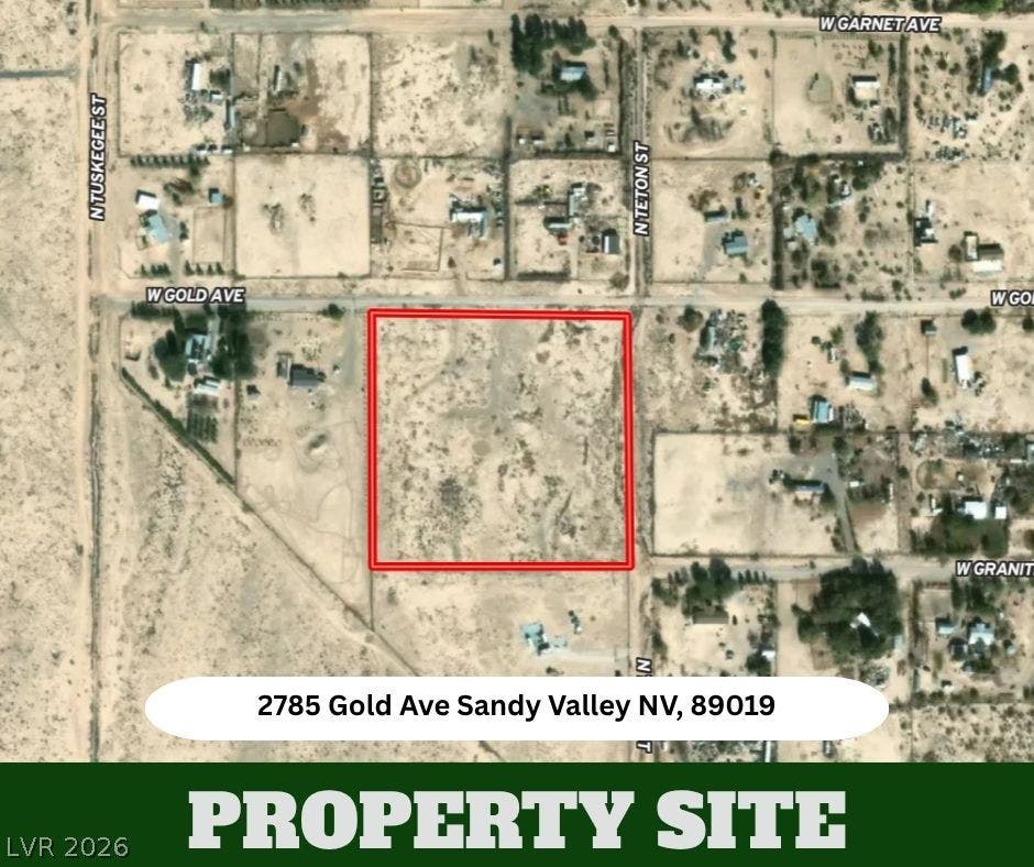 An aerial perspective outlines the generous dimensions of this vacant desert lot.