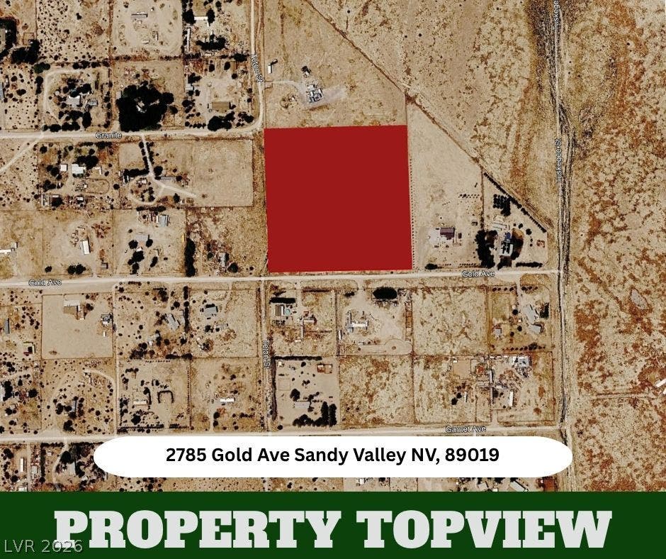 An aerial overview highlights the generous parcel boundaries of this desert property.